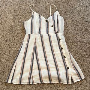 Stripes are five different colors, black, blue, pink, burnt organs, turquoise